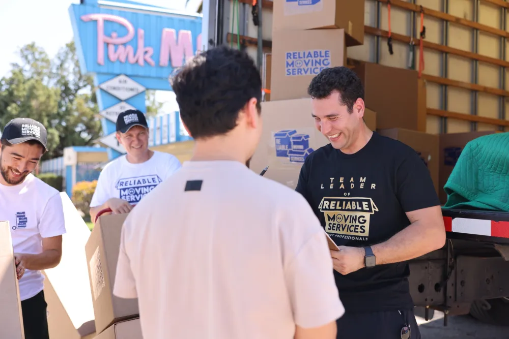 The Reliable Moving Services Los Angeles crew together on a job.