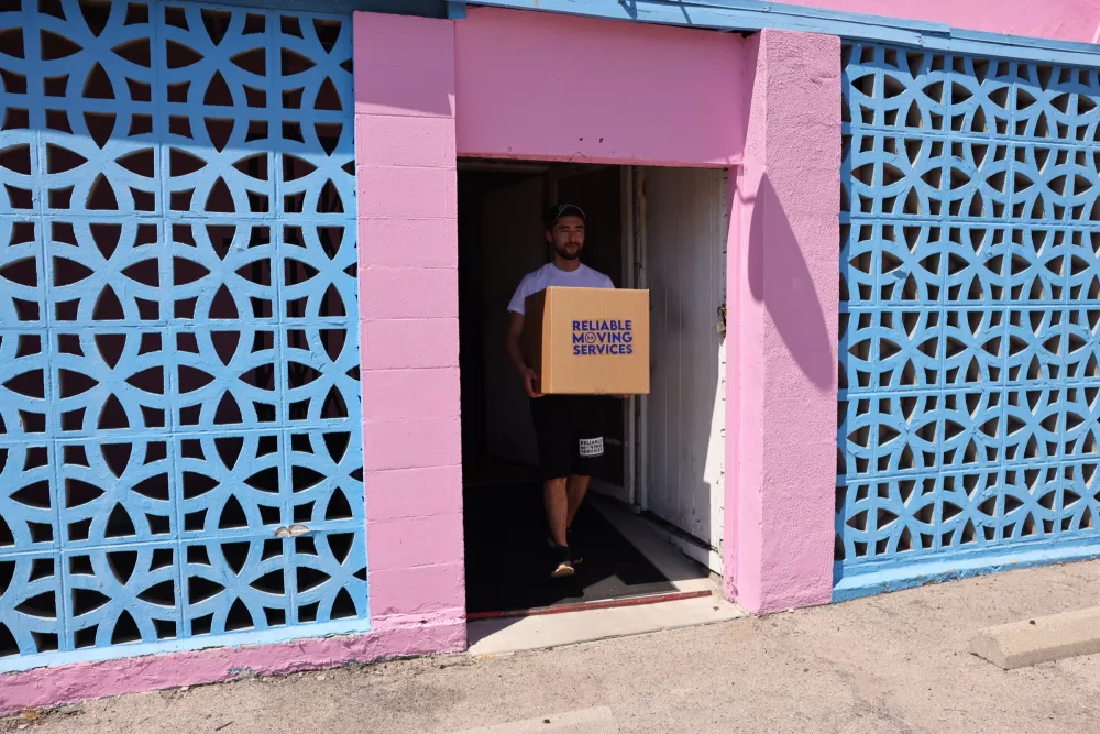 Reliable Moving Services crew handling a commercial office move in Los Angeles.
